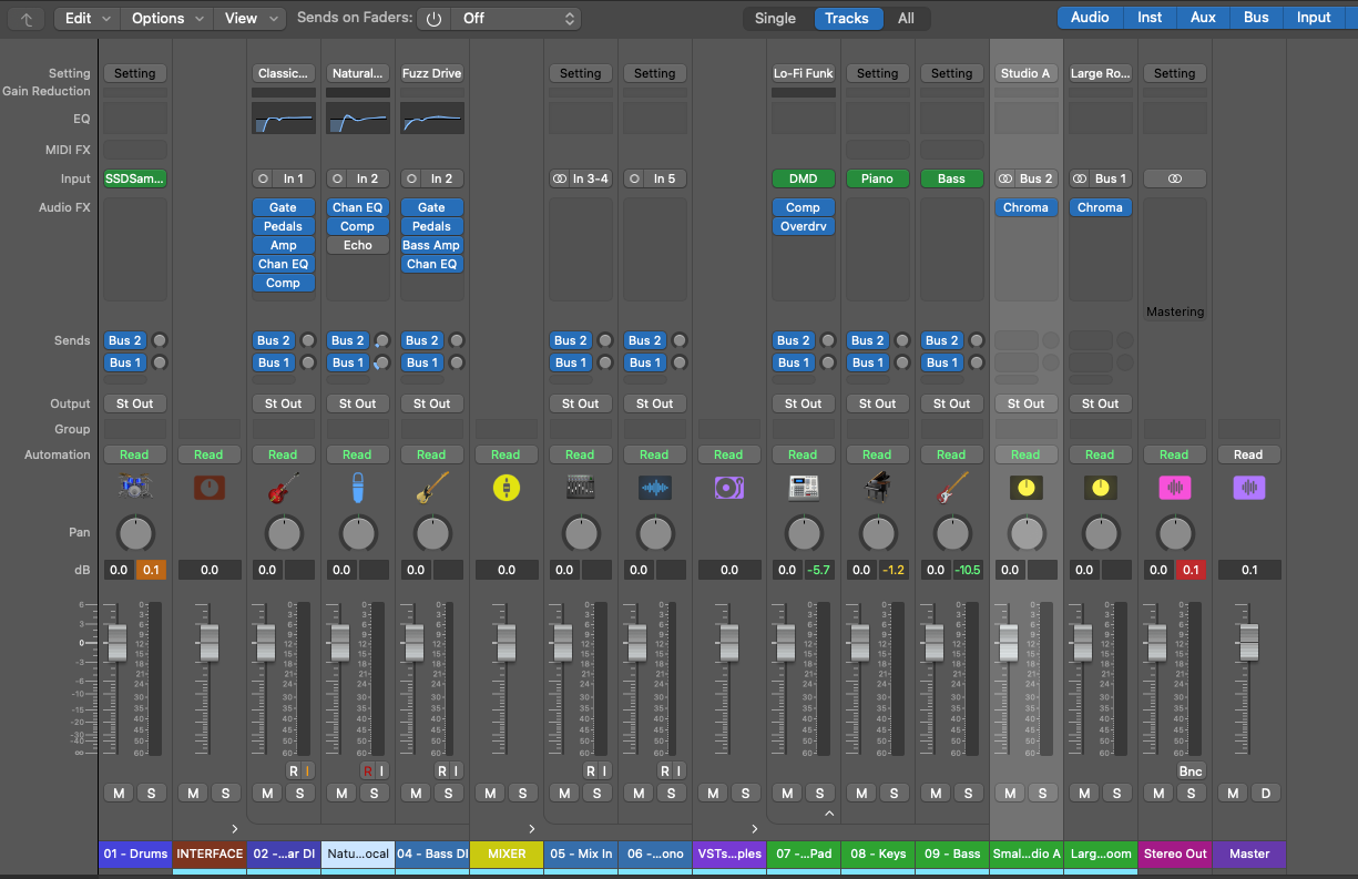Logic Pro mixer view with grouped studio tracks and signal paths already prepared.