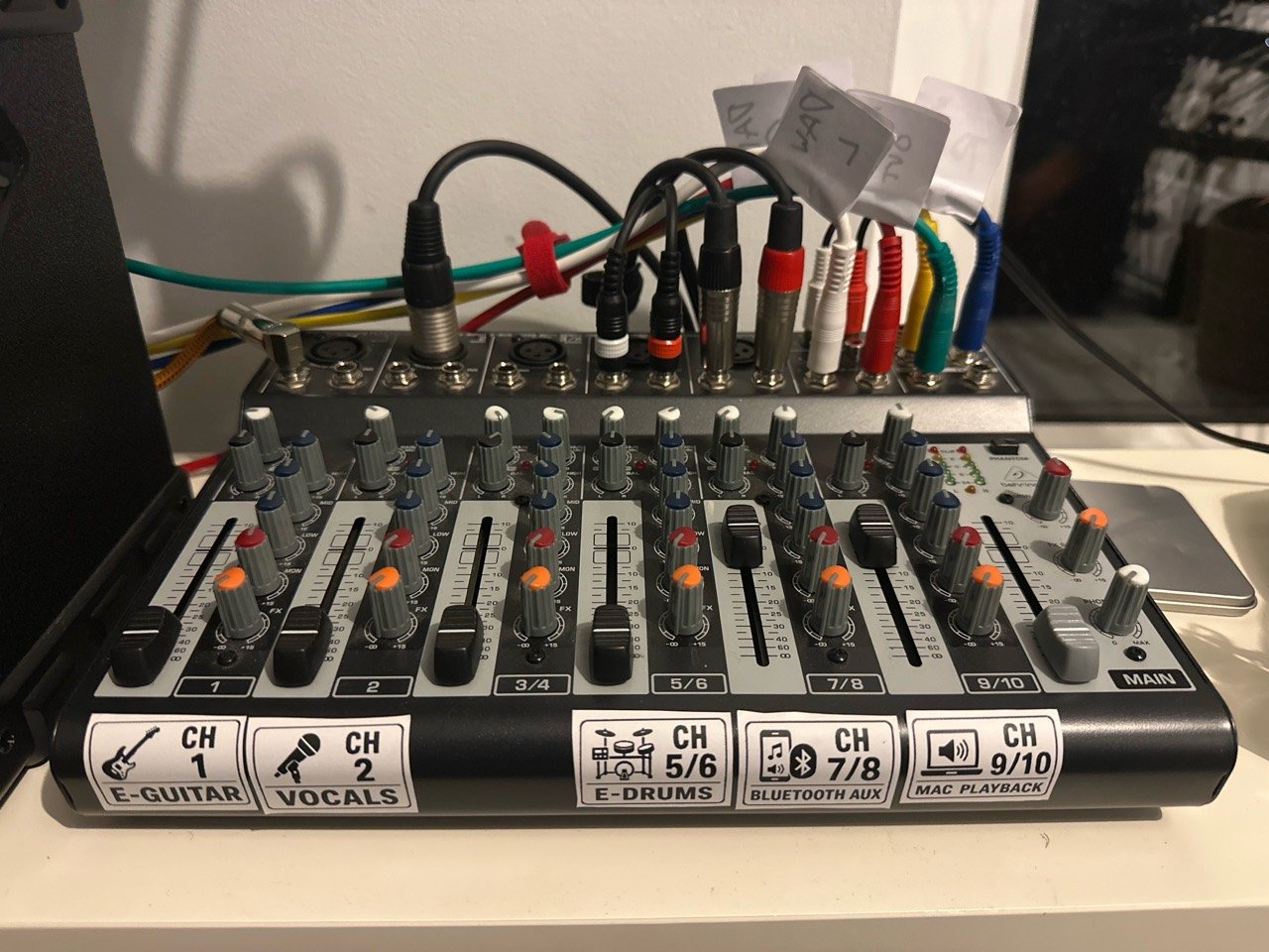 Labelled studio mixer ready for guitar, vocal, drums and Mac playback.